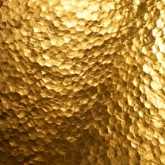 Sculpted gold material sample